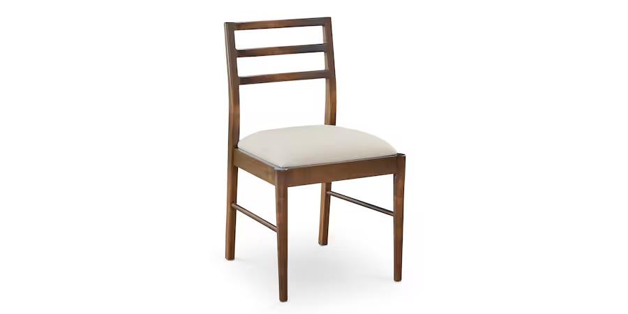 Wooden chair with a ladder back and a cushioned seat.