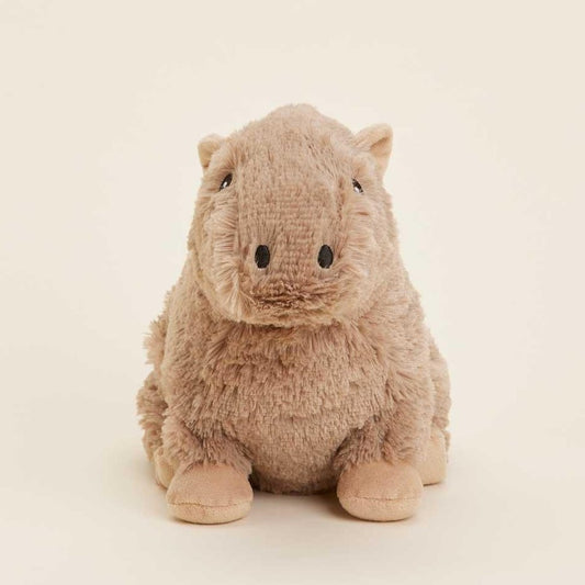 A plush capybara toy facing forward against a plain background.
