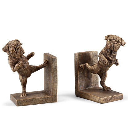 Bronze pug bookends, each balancing on one leg with playful expressions.