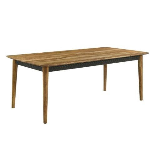 A rectangular wooden dining table with tapered legs and a dark textured apron.