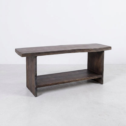 Dark wooden bench with a sturdy plank design.
