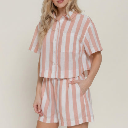 Woman in a striped, short-sleeve matching set.