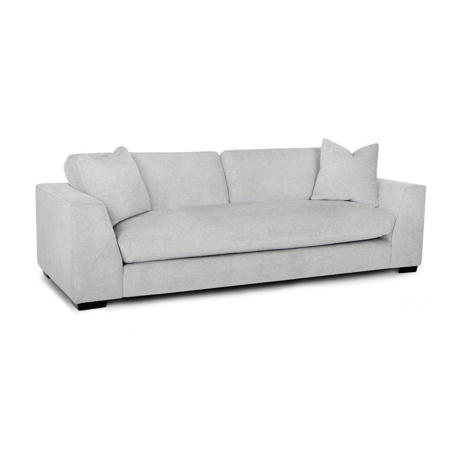 Light gray sofa with two pillows on each end.