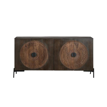 Dark wooden sideboard with intricate circular carvings on doors.