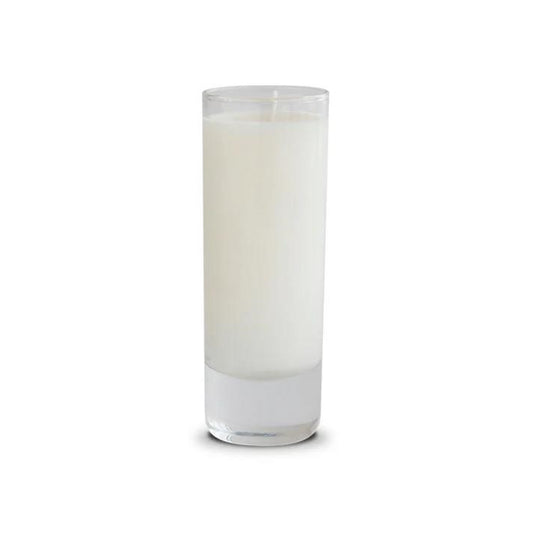 Tall white candle in a clear glass container.