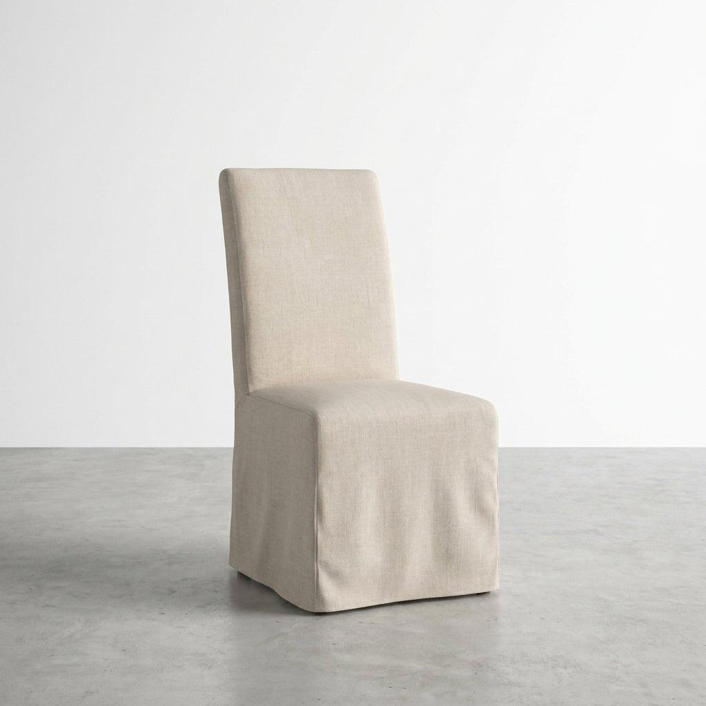 Beige linen chair with clean, simple design and straight lines.