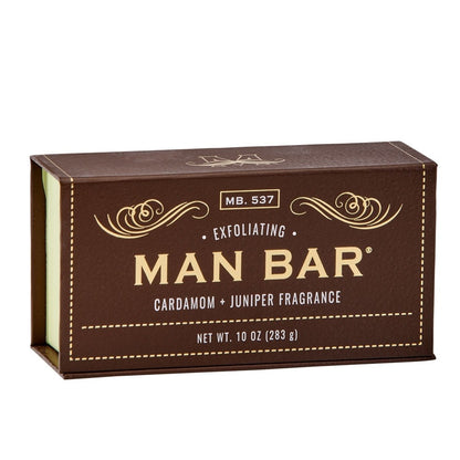 Brown box with "Man Bar" soap, cardamom and juniper fragrance.