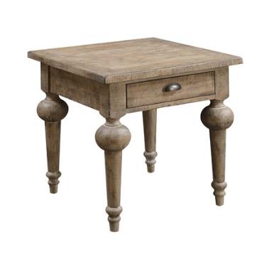 Wooden side table with a drawer and ornate turned legs.