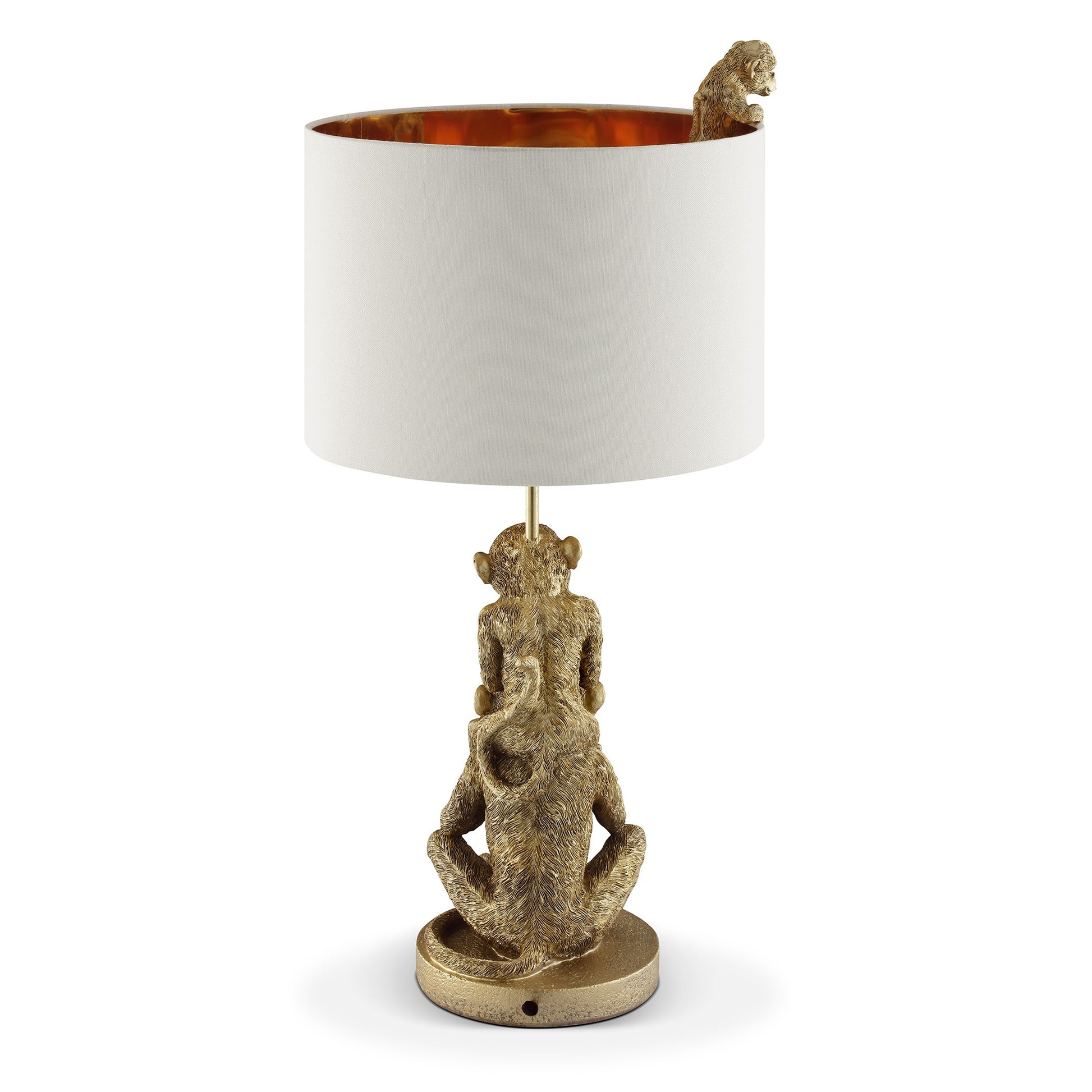 Golden monkey lamp with white shade, one monkey peeking inside.