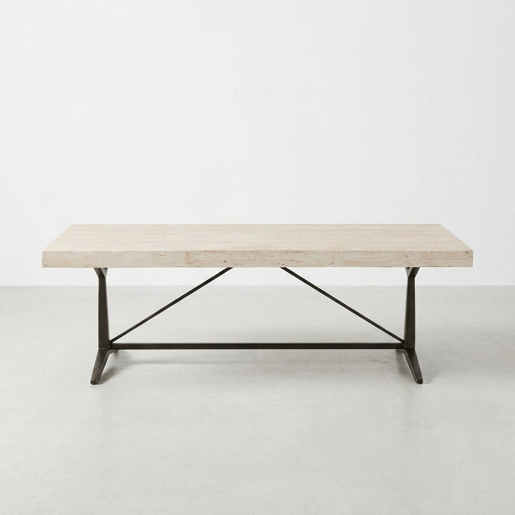 Minimalist table with a metal base and light wood top.