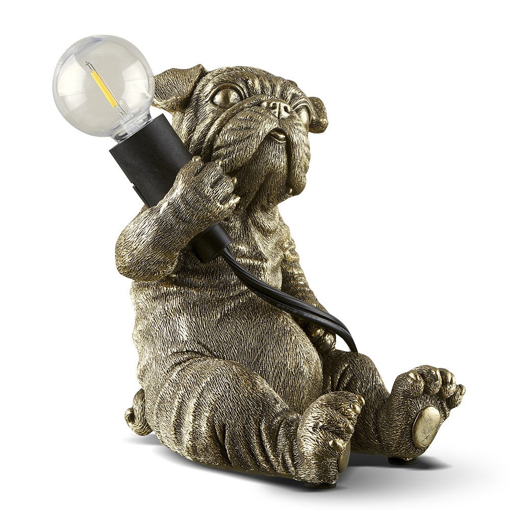 Pug-shaped lamp holding a lightbulb.
