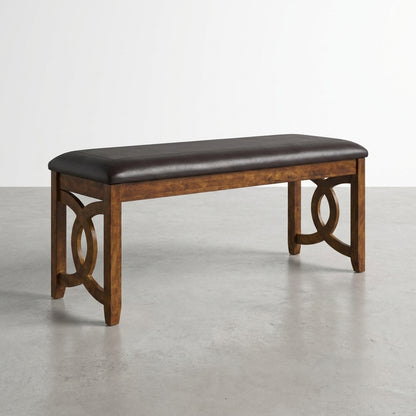 Wooden bench with black cushion and decorative side panels.
