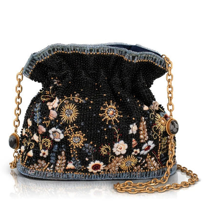 Ornate black beaded purse with floral embroidery and gold chain strap.