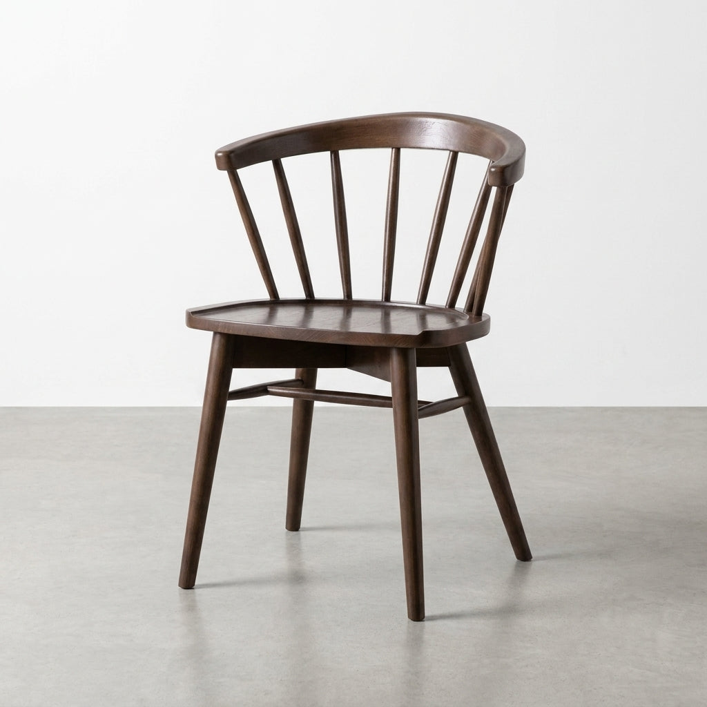 Dark wooden chair with a curved back and simple design.