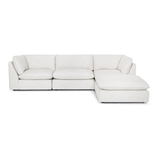 White L-shaped sectional sofa with cushioned seats.