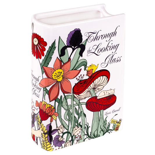 Book-shaped vase with vibrant flowers and "Through the Looking Glass" text.