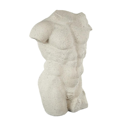 Stone torso sculpture with defined muscles.