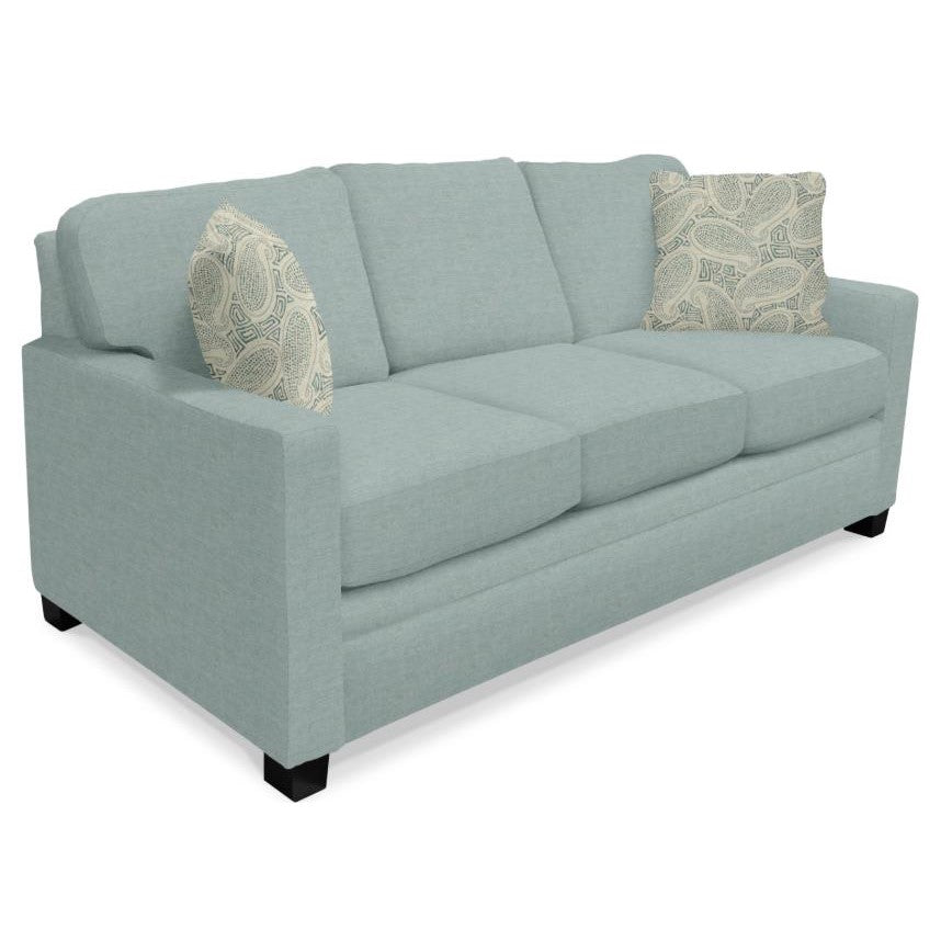 Light blue sofa with two patterned pillows.