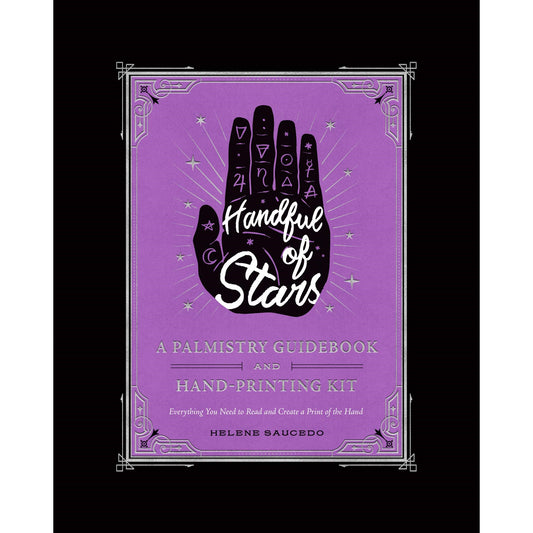 Purple palmistry book cover with mystical hand design.