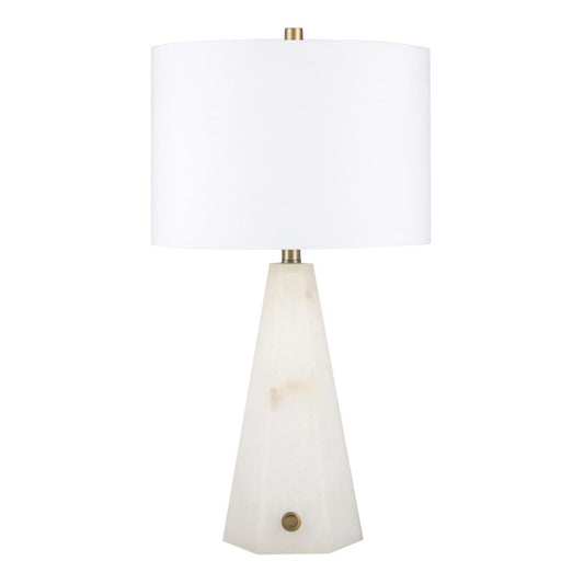 Elegant lamp with a white geometric base and a large drum shade.