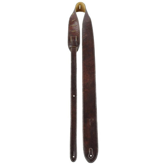 Brown leather guitar strap with stitching details.