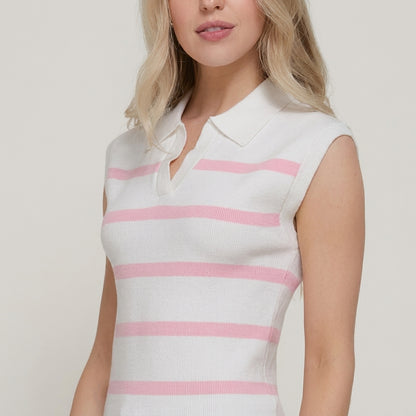 Woman in sleeveless pink-striped polo top.