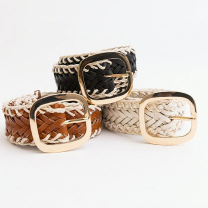 Three woven belts with gold buckles in black, brown, and white.
