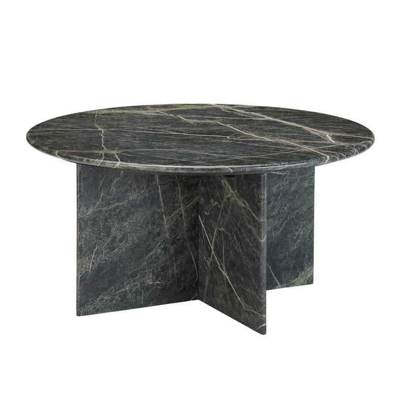 Round, dark marble table with intersecting base.