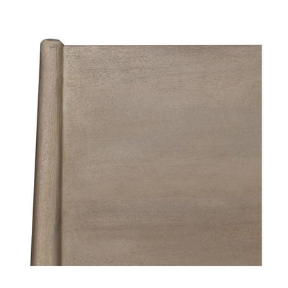 Close-up of a wooden surface with a smooth texture and light brown finish.