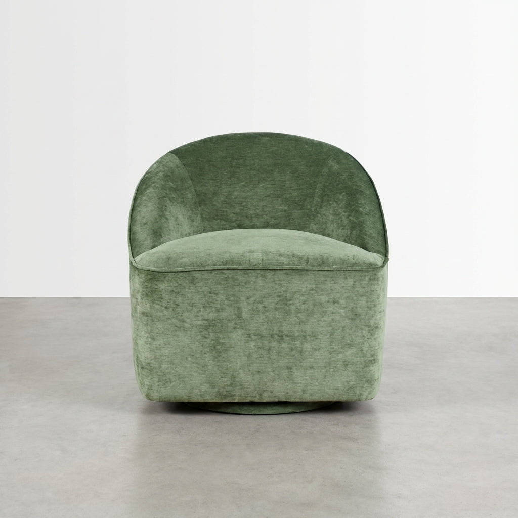 Green velvet upholstered swivel chair with a rounded backrest.