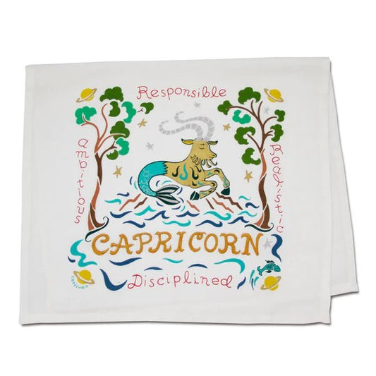 Capricorn design with a goat, words like Ambitious, Realistic, and colorful trees.