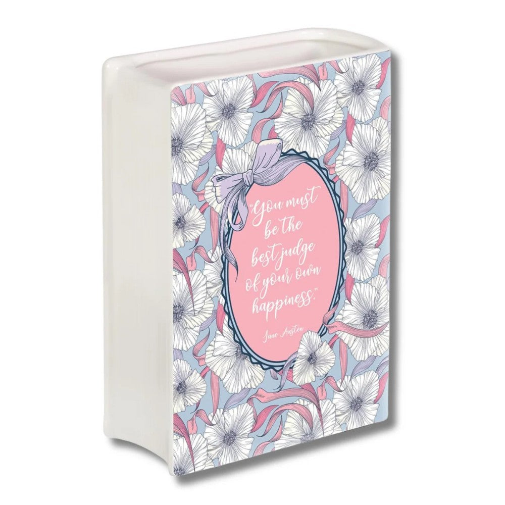 Floral box with a quote: "You must be the best judge of your own happiness."