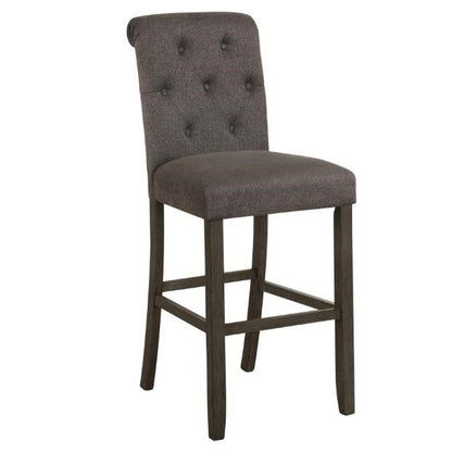 Gray upholstered barstool with tufted backrest and wooden legs.