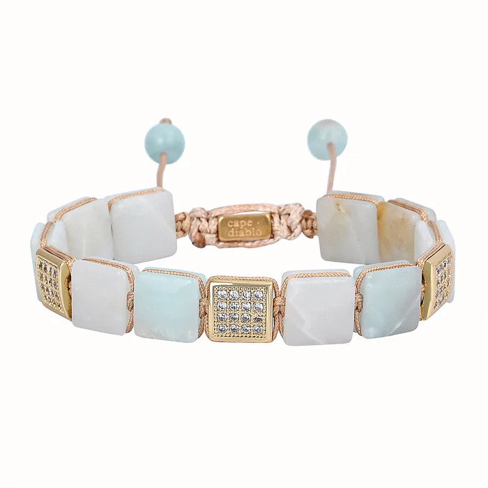 Elegant bracelet with stone and gold accents.