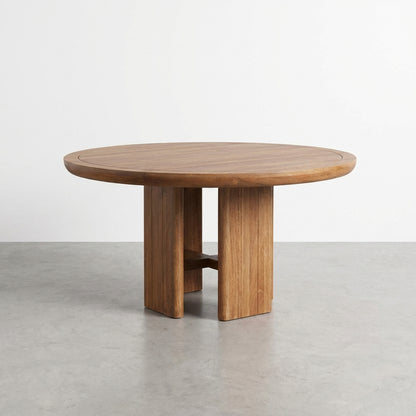 Round wooden table with a solid, modern design.