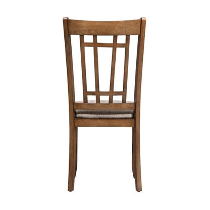 Wooden chair with lattice backrest and padded seat, viewed from behind.