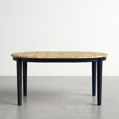Oval table with wooden top and dark blue legs.
