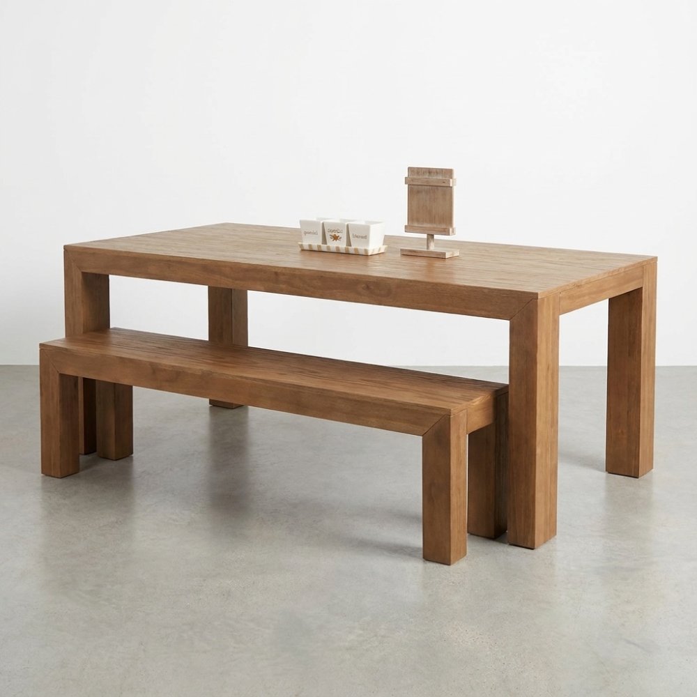 Wooden table and bench set with spice jars on top.