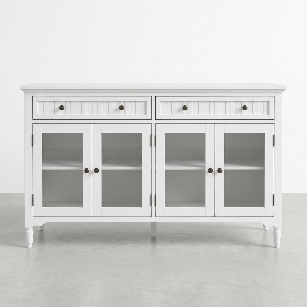 White sideboard with glass cabinet doors and drawers, on a gray floor.