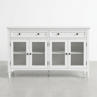 White sideboard with glass cabinet doors and drawers, on a gray floor.