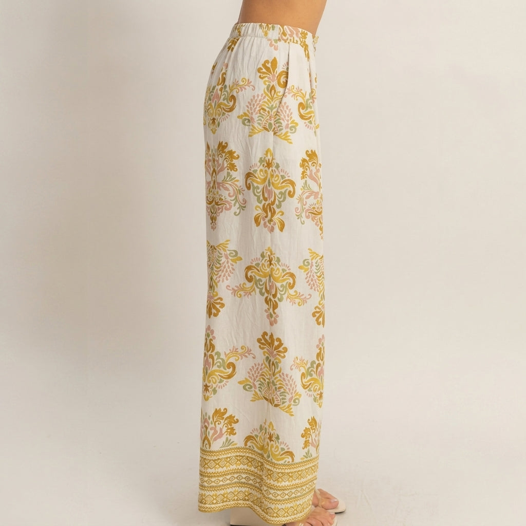 Side view of person in patterned wide-leg pants.