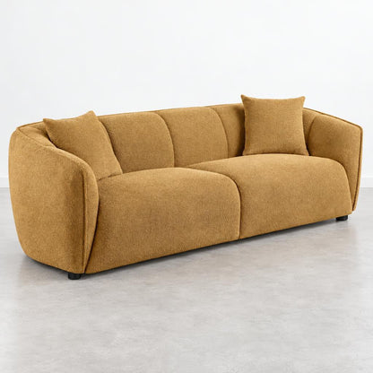 Cozy brown sofa with two matching cushions, set on a light gray floor.