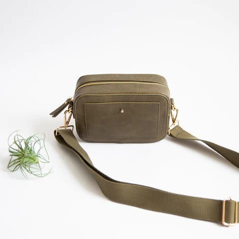 Olive green crossbody bag with gold hardware on a white background.