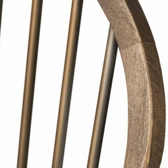 Close-up of a wooden chair with vertical slats.