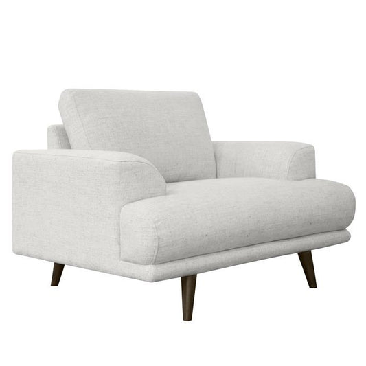 Modern white armchair with wooden legs.