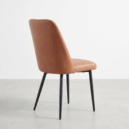 Modern brown chair with black metal legs, angled back view.