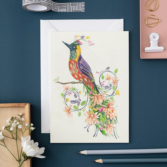 Colorful bird illustration on a card with floral details.