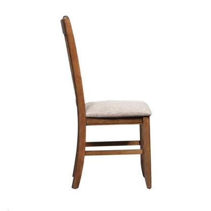 Wooden chair with cushion seat, side view.