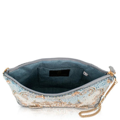 Ornate blue clutch with beaded design and chain strap, open to show interior pocket.