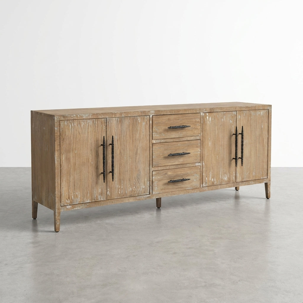 Rustic wooden sideboard with drawers and cabinet doors, black handles.